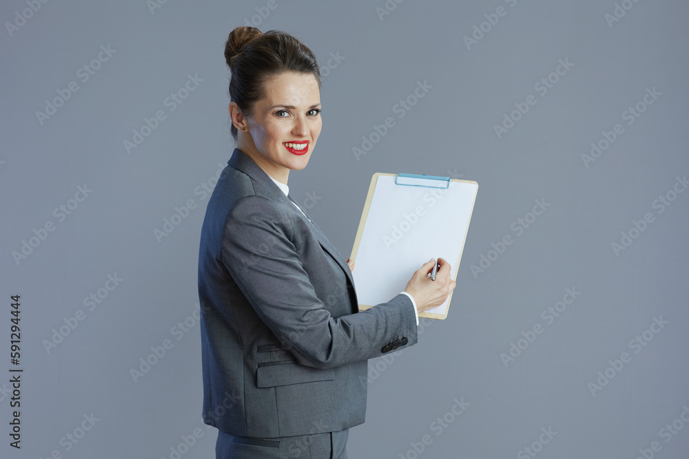 happy modern business woman isolated on grey happy modern business woman isolated on grey