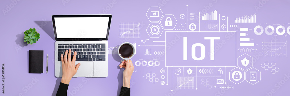 IoT theme with person using a laptop computer IoT theme with person using a laptop computer