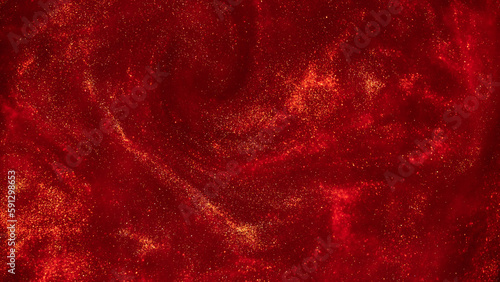 Magic Galaxy of golden dust particles in red fluid.