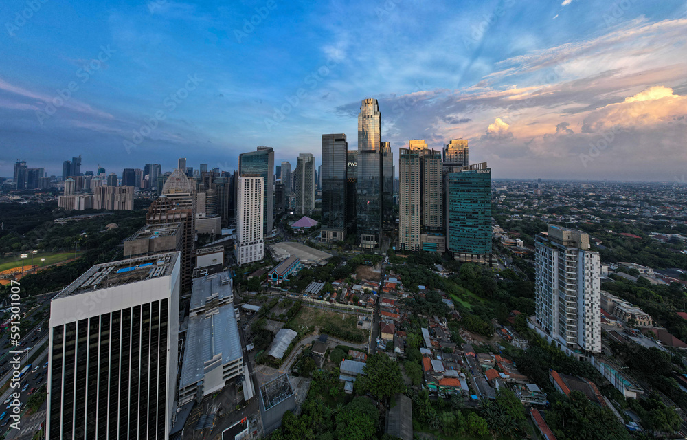 Obraz premium aerial photos of Sudirman street and Jakarta Skyline in the golden hour. 