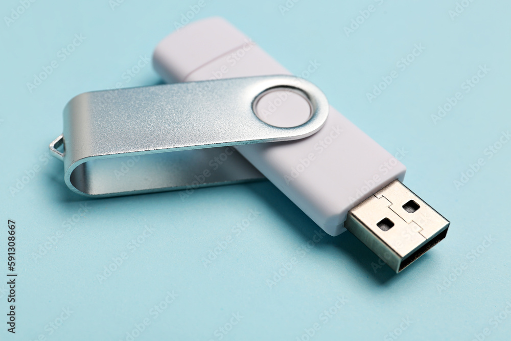 White USB flash drive on color background White USB flash drive on color background