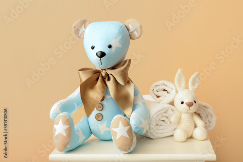 Toy bear and bunny with tow...
