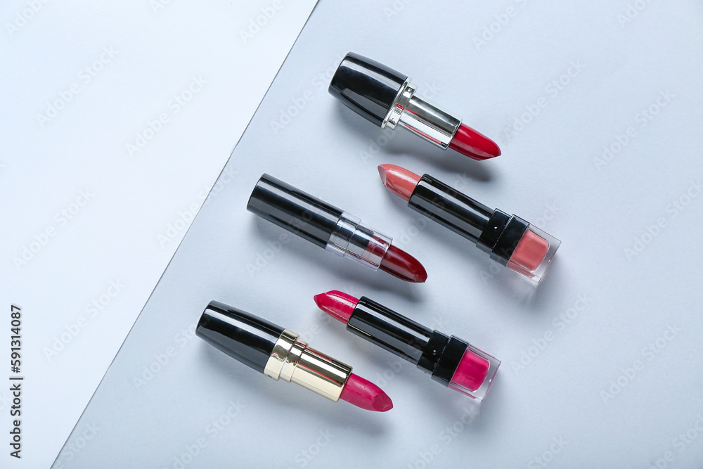 Set of different lipsticks on light background Set of different lipsticks on light background