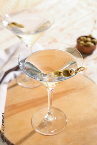 Glasses of tasty martini an...