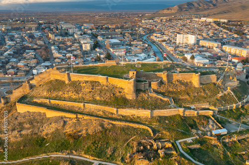 Aerial view of medieval Gori fortress and city center of Gori on sunset, Georgia
