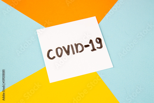 top view covid- writing on colored background color hospital lab virus health covid- pandemic science