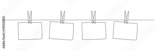 Photo frames hanging on the rope with clothespins in one continuous line drawing. Clothesline with pin and peg for photo album design concept in simple linear style. Editable stroke. Doodle vector
