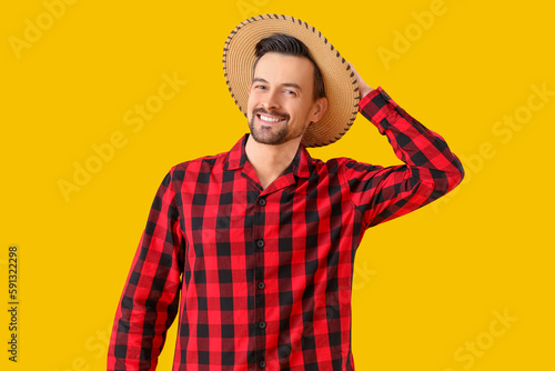 Handsome man on yellow back...