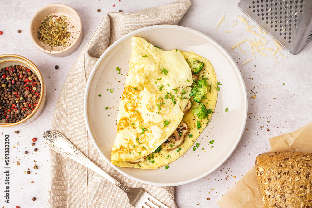 Ταπετσαρία Tasty omelet with broccoli and mushrooms on light table