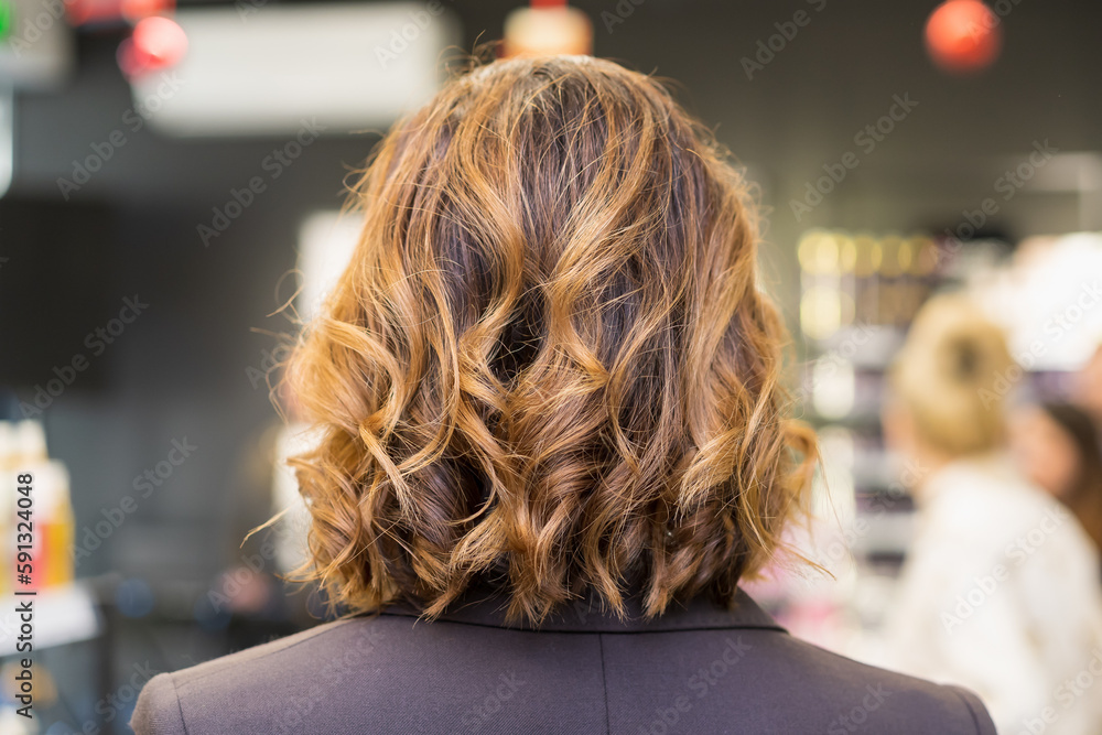 Fototapeta premium The process of creating hairstyles, hair care. Background, selective focus.