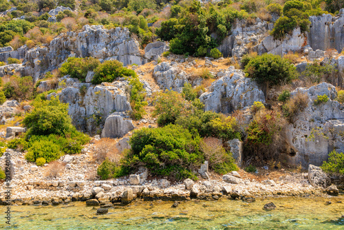 The ruins of a sunken ancient city on the island of Kekova Lycian Dolichiste in Turkey in the province of Antalya photo