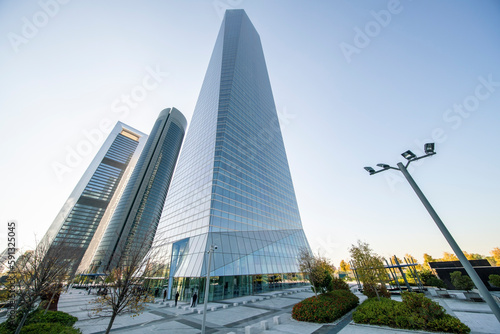 Cuatro Torres Business Area in Madrid with blue sky, spain photo
