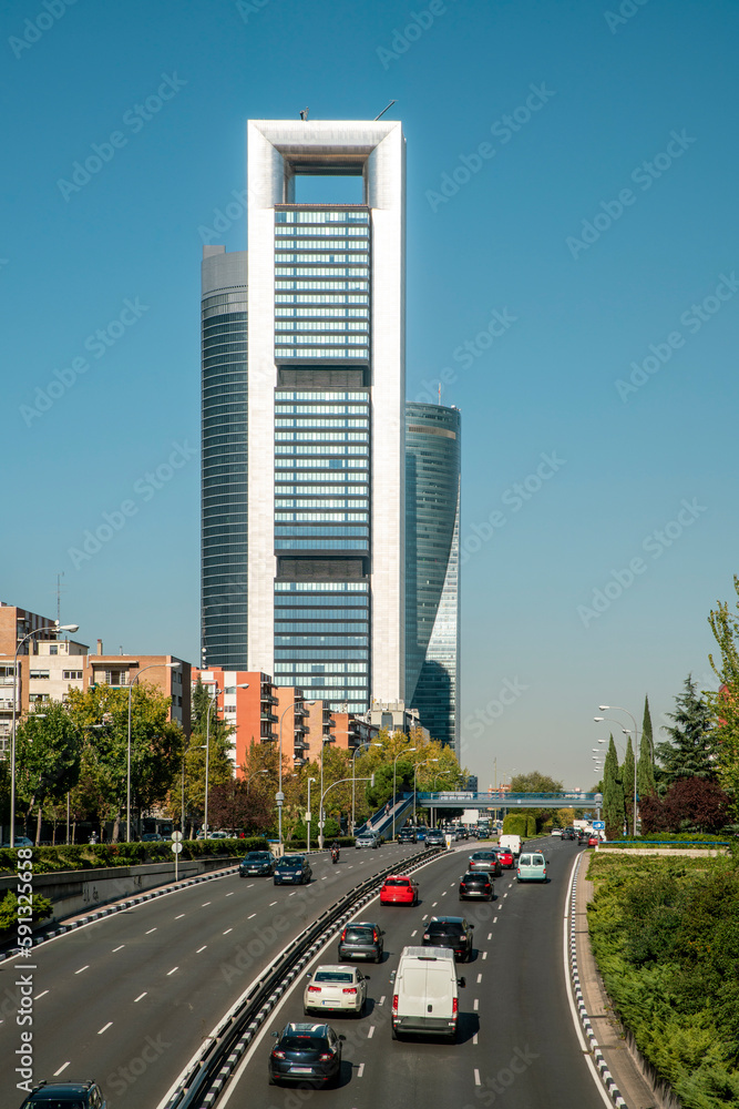 Road at Financial business district in Madrid with Cuatro Torres towers area, spain