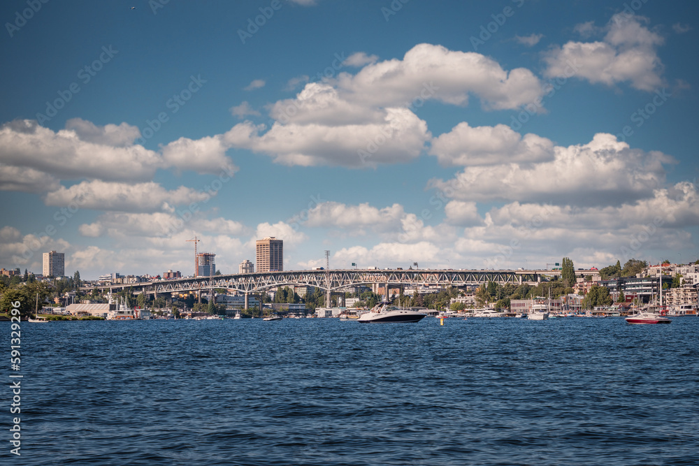 2019-08-01 SOUTH LAKE UNION AND THE UNIVERSITY BRIDGE WITH BOATS ON THE WATER AND A NICE CLOUDY SKY IN SEATTLE WASHINGTON