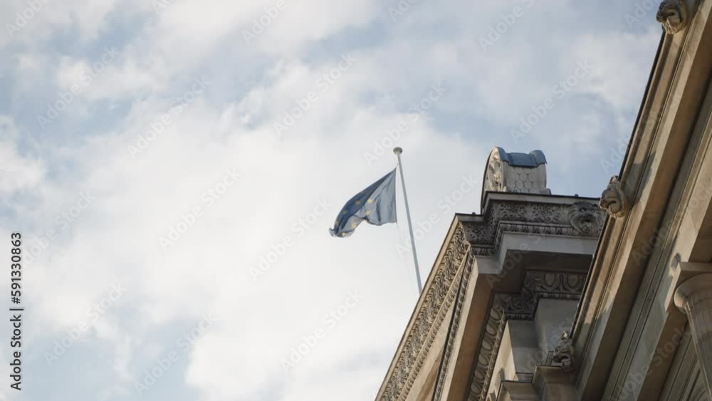 Broken EU flag on top of governmental building Broken EU flag on top of governmental building