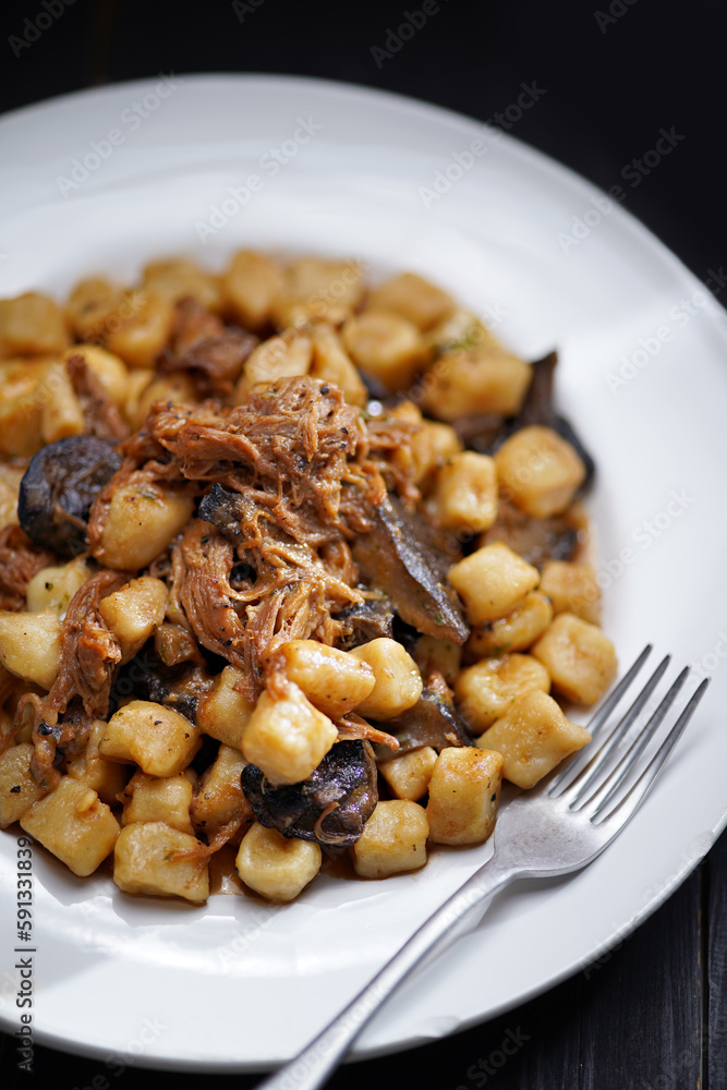 italian gnocchi potato dumplings in duck ragu meat sauce