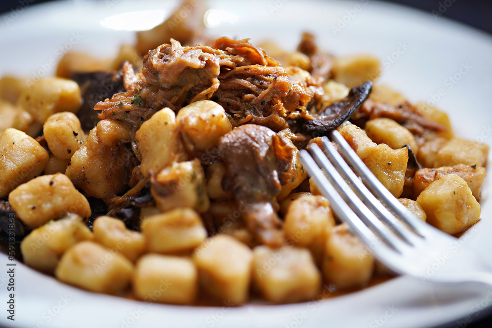 italian gnocchi potato dumplings in duck ragu meat sauce