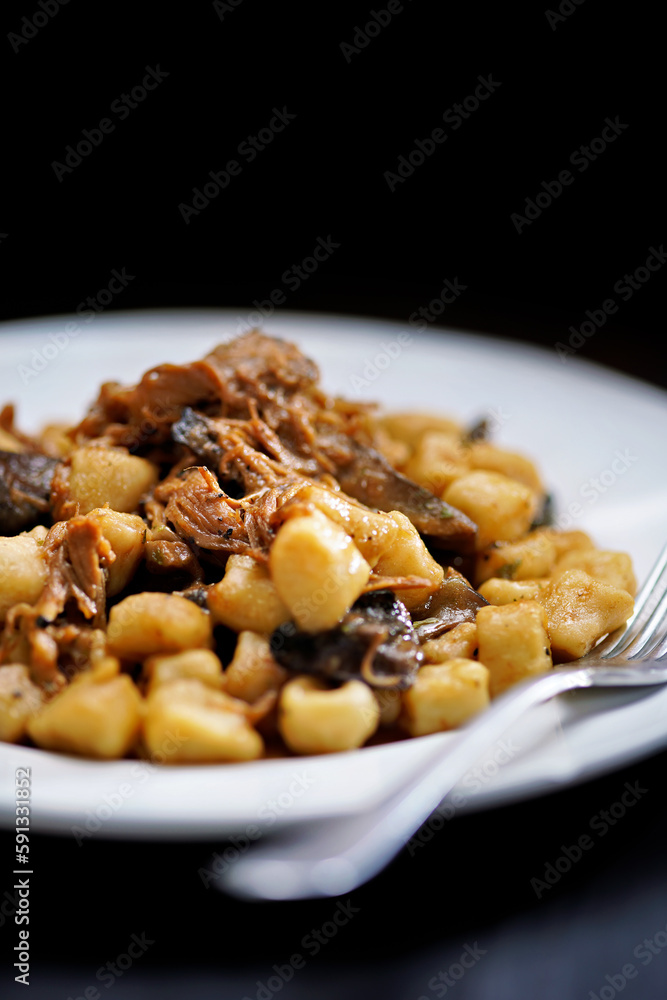 italian gnocchi potato dumplings in duck ragu meat sauce