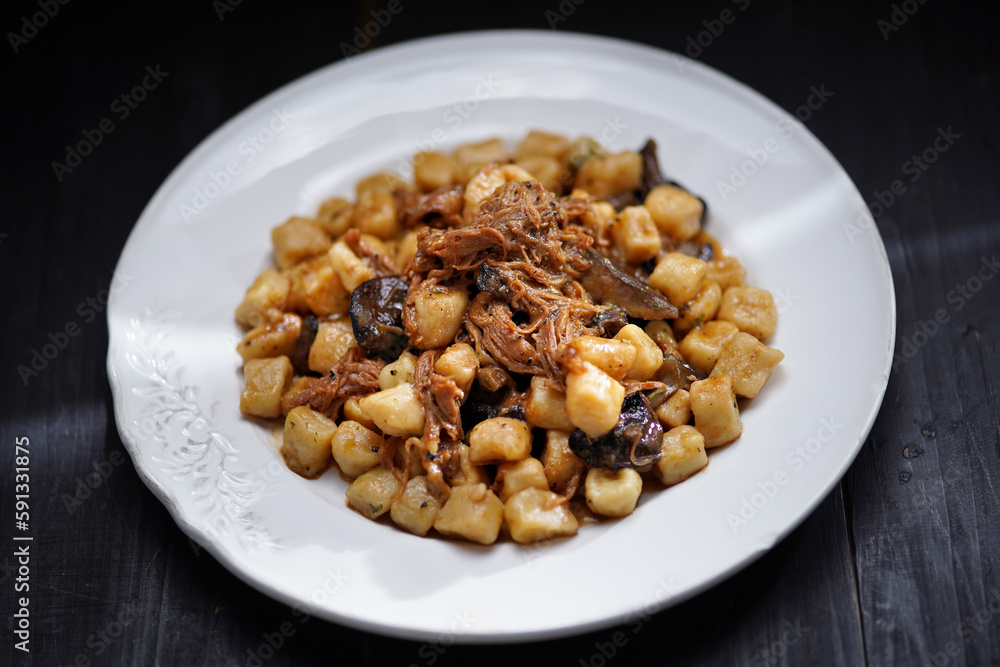 italian gnocchi potato dumplings in duck ragu meat sauce