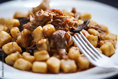 Obraz na płótnie italian gnocchi potato dumplings in duck ragu meat sauce w salonie