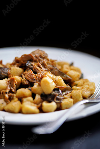 Obraz na płótnie italian gnocchi potato dumplings in duck ragu meat sauce w salonie