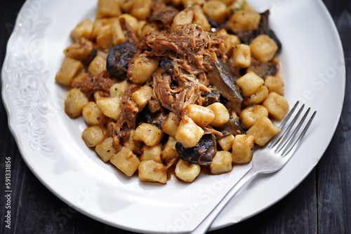 Obraz na płótnie italian gnocchi potato dumplings in duck ragu meat sauce w salonie