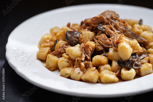 italian gnocchi potato dumplings in duck ragu meat sauce