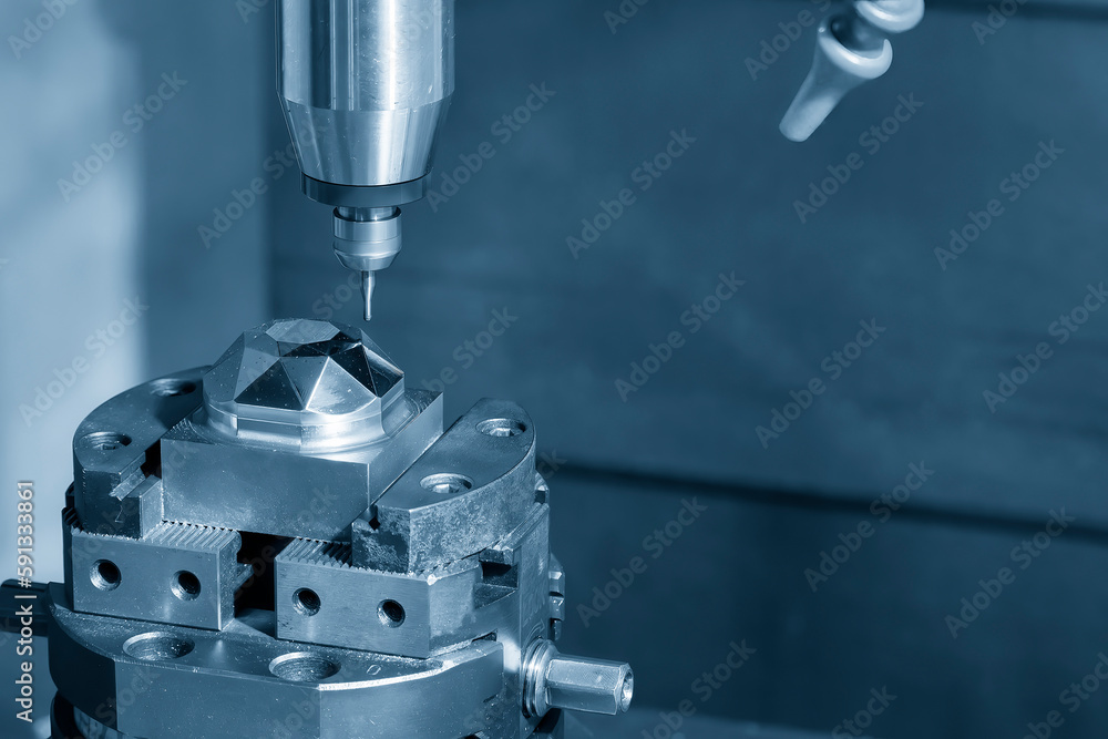 The CNC milling machine cutting mirror surface mold part by solid ball end mill tool. The CNC milling machine cutting mirror surface mold part by solid ball end mill tool.