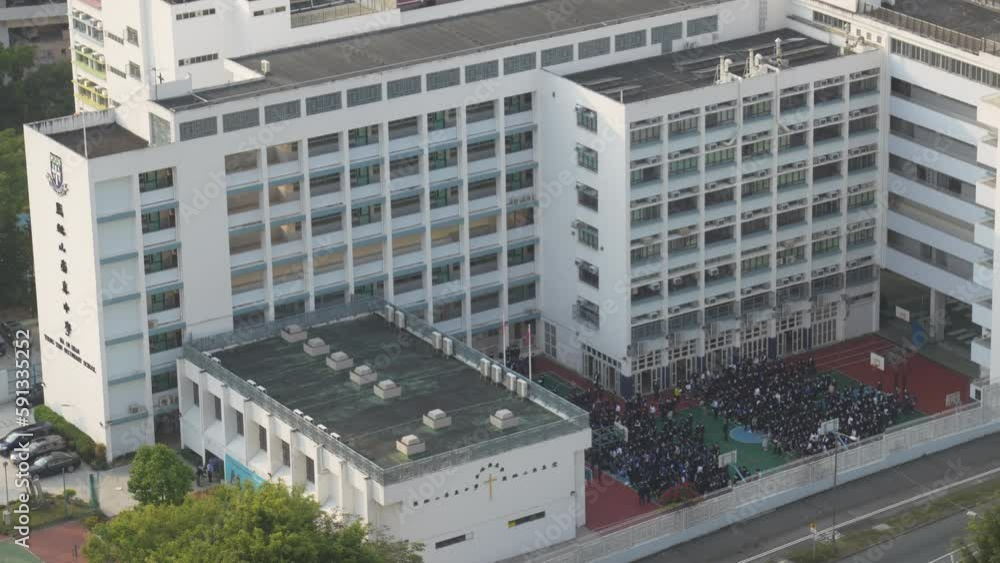 Students Forming in Hong Kong School Courtyard. Wide Angle Shot of Hong Kong School Students Forming in Hong Kong School Courtyard. Wide Angle Shot of Hong Kong School