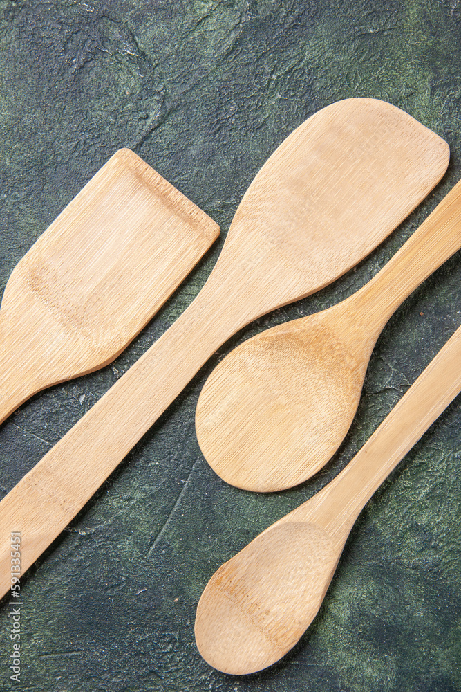 top view wooden utencils on dark background knife kitchen cutlery wood color food top view wooden utencils on dark background knife kitchen cutlery wood color food