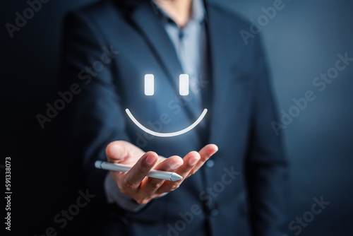 Customer Satisfaction Survey, Businessman holding Smile icon satisfaction, service experience rating online application, customer evaluation product service quality, satisfaction feedback review.