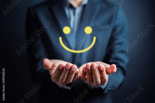 Obraz na plátně Customer Satisfaction Survey, Businessman holding Smile icon satisfaction, service experience rating online application, customer evaluation product service quality, satisfaction feedback review