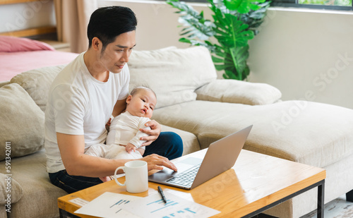 image of asian father and son at home © 1112000