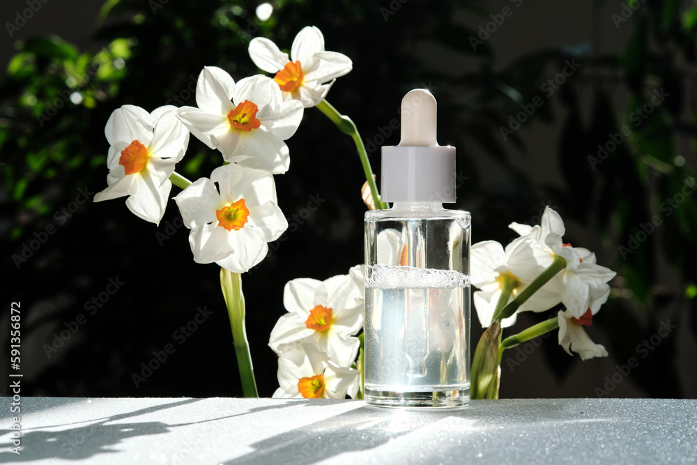 A bottle of serum with a dropper. A bottle of serum with a dropper.
