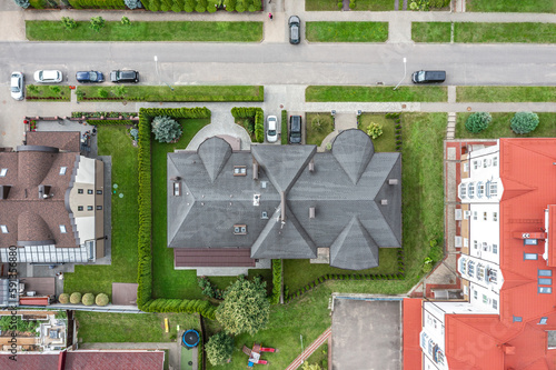 aerial view from above of middle class suburb neighborhood houses. drone photo.