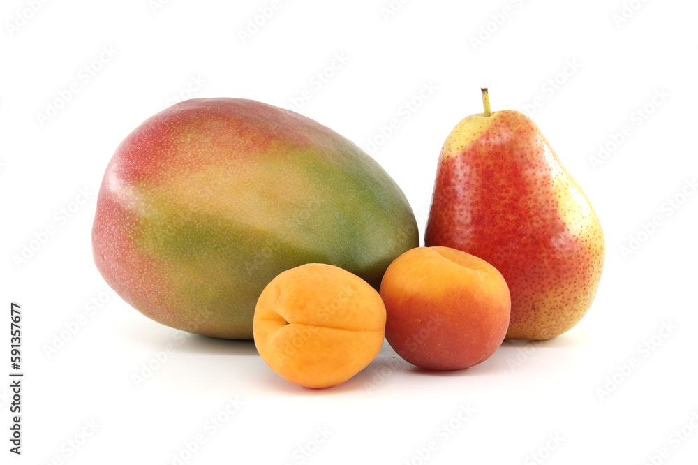 Whole ripe apricot, pear and mango fruit over white Whole ripe apricot, pear and mango fruit over white
