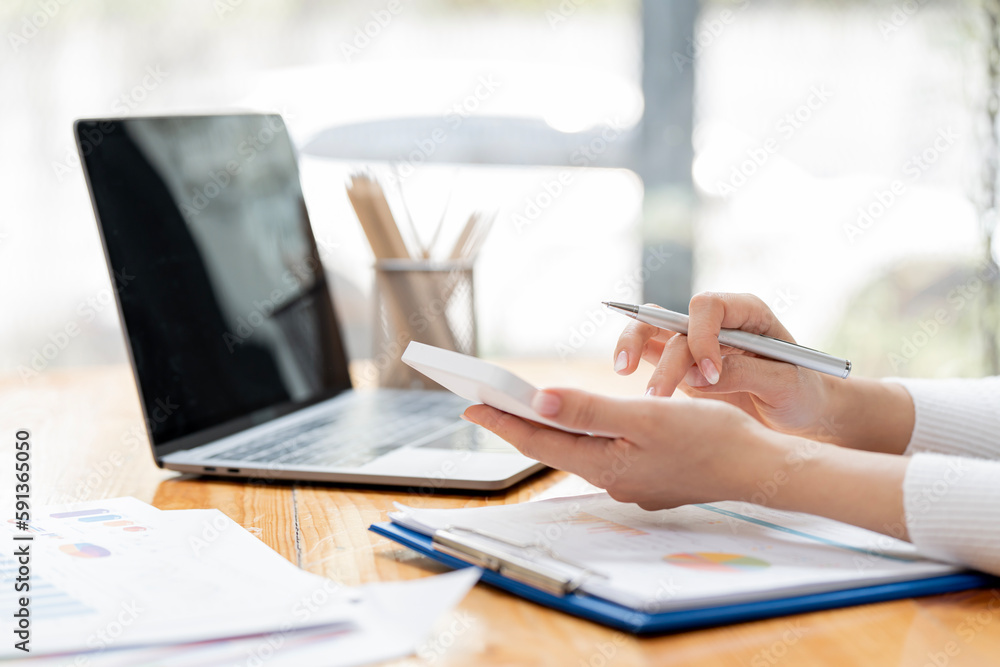 Accountant working Financial investment on calculator, calculate, analyze business and marketing growth on financial document data graph. Accountant working Financial investment on calculator, calculate, analyze business and marketing growth on financial document data graph.