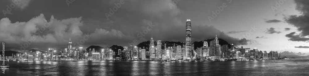 Panorama of Victoria harbor of Hong Kong city at dusk