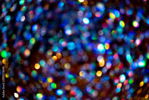 Glittering stars of bokeh use for celebrate background. Abstract lights background with bokeh defocused lights. Valentines Day, Party, Christmas background. Blur bokeh light. Glitter lights.