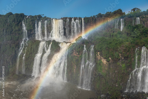 Beautiful view to Iguazu Falls waterfalls with rainbow