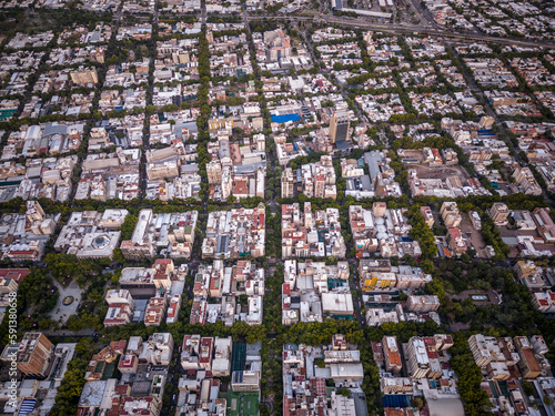Beautiful aerial view to city buildings and green public streets