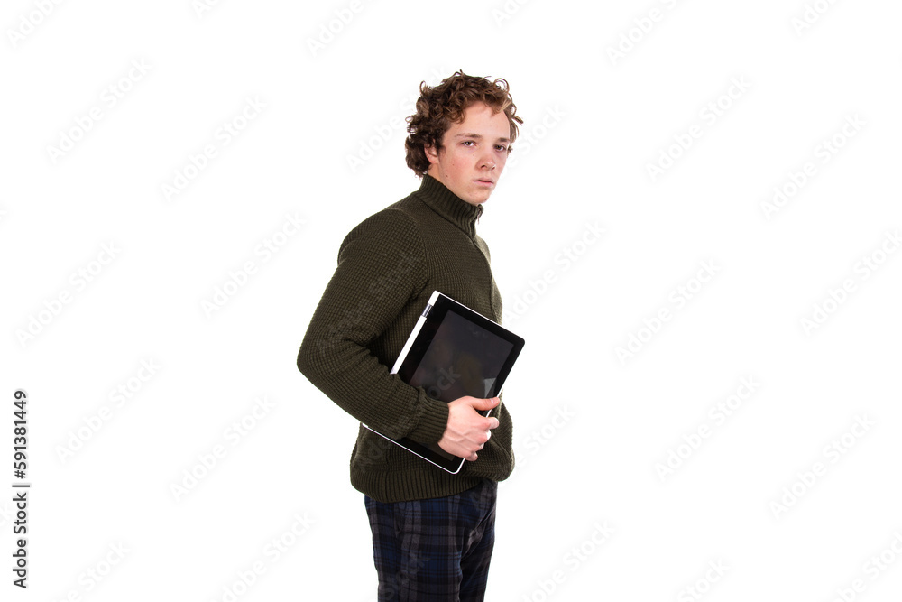 A young attractive man is working on a laptop. Early morning. White background. A young attractive man is working on a laptop. Early morning. White background.