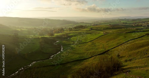 Flying at Malham Cove at sunrise photo