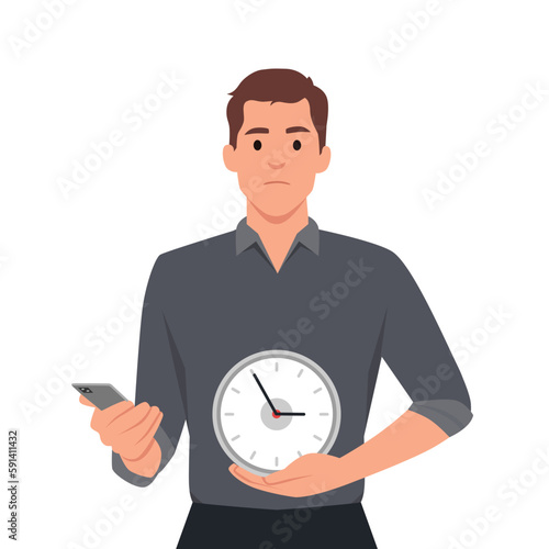 Young man holding phone and clock time, showing how much time you spent on your smart phone. Sad and angry emotions