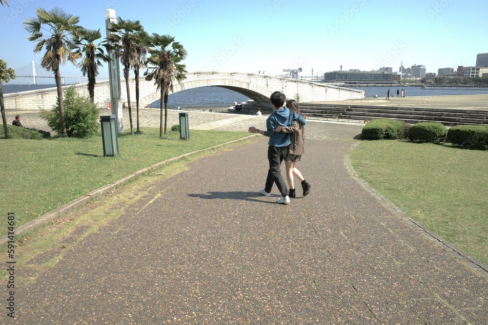 Naklejka premium person walking on the street