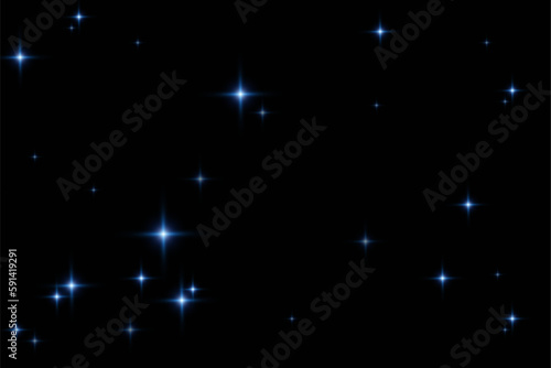 Particles of magic dust. Shining light particles.Christmas glitter particles. Light effect on a transparent background