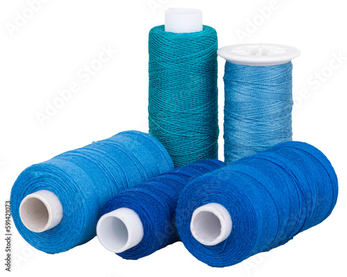 Fototapeta Spools with blue thread and for sewing, supply for sewing, isolated objects