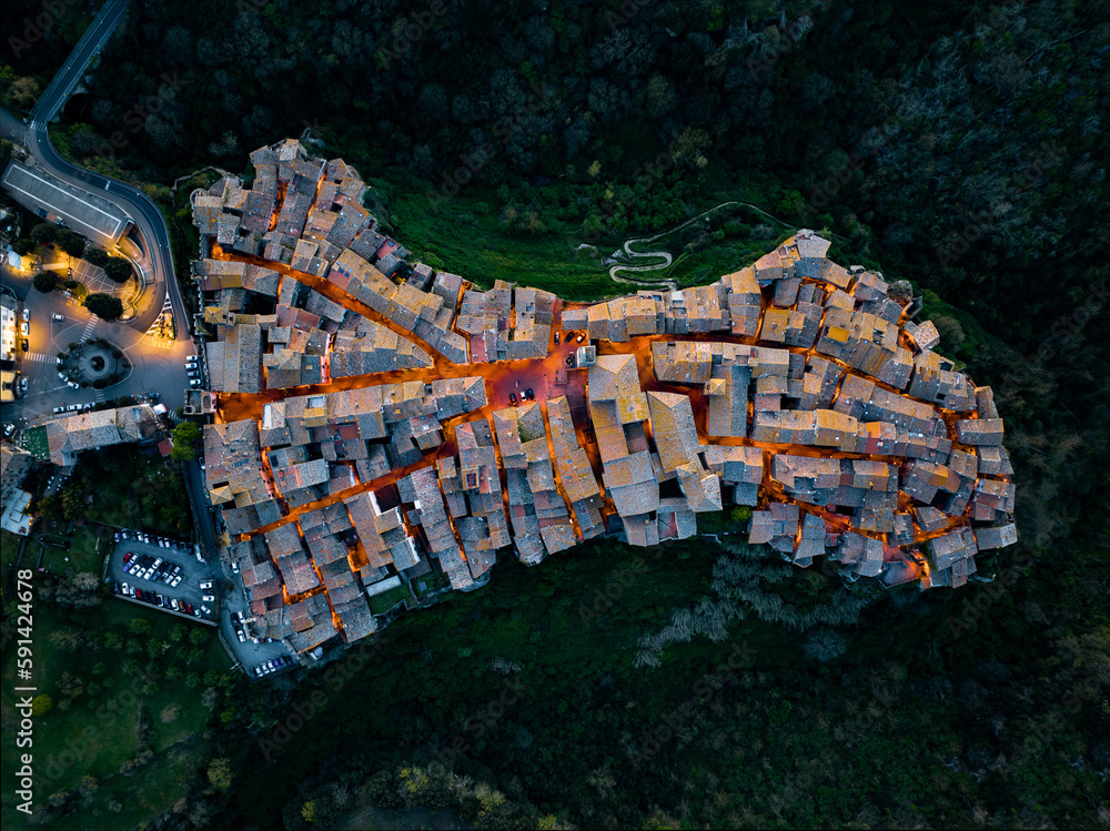 View from above, stunning aerial view of the village of Vitorchiano at dusk. Vitorchiano is a medieval Italian village in Viterbo Province, Lazio, Italy.