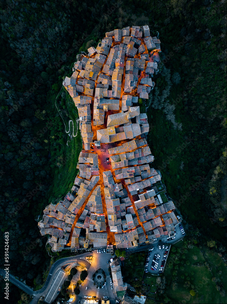 View from above, stunning aerial view of the village of Vitorchiano at dusk. Vitorchiano is a medieval Italian village in Viterbo Province, Lazio, Italy.