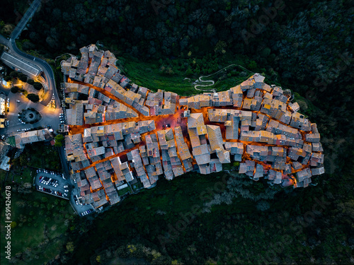 Obraz na płótnie View from above, stunning aerial view of the village of Vitorchiano at dusk. Vitorchiano is a medieval Italian village in Viterbo Province, Lazio, Italy. w salonie